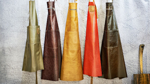 What Are the Different Styles of Leather Aprons Available?